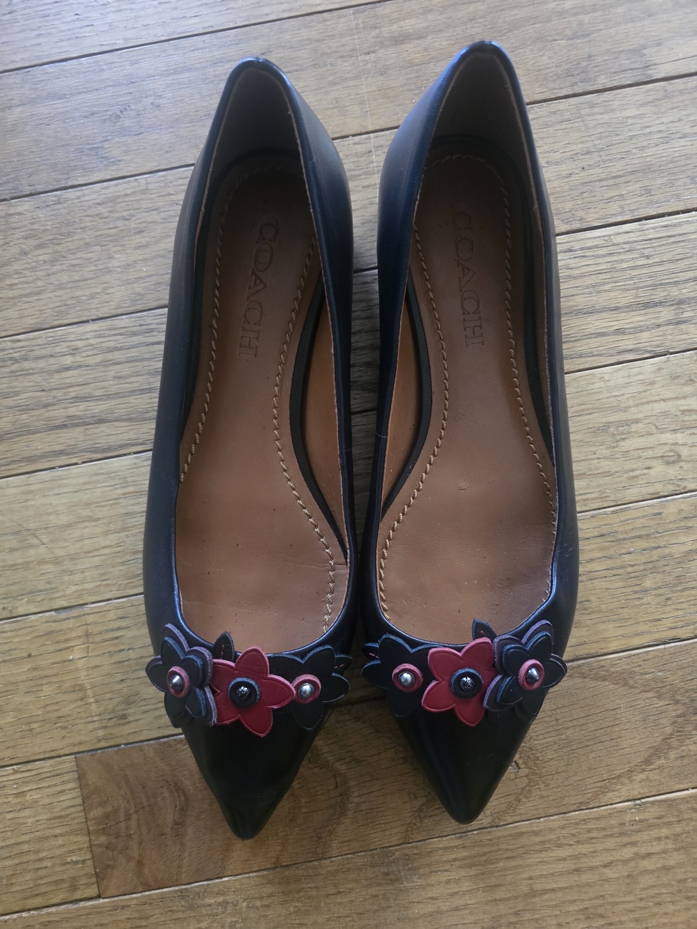 Coach Black Leather Pointed Toe Flats with Red Floral Appliqué